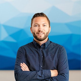 Mitarbeiter Thomas Weigel schaut in die Kamera