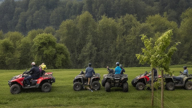 Quad Gruppe macht auf einer Wiese Pause